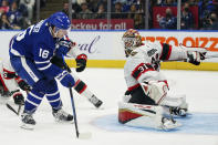 Toronto Maple Leafs forward Mitchell Marner (16) prepares to shoot against Ottawa Senators goaltender Anton Forsberg (31) during third-period NHL hockey game action in Toronto, Saturday, Oct. 16, 2021. (Evan Buhler/The Canadian Press via AP)