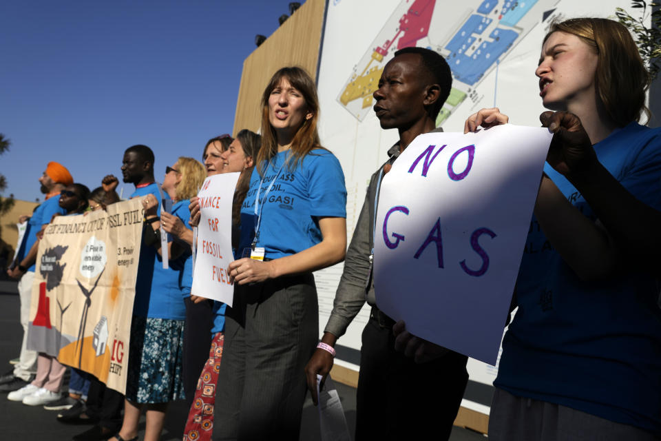 A group of demonstrators participate in an event protesting the use of fossil fuels at the COP27 U.N. Climate Summit, Wednesday, Nov. 9, 2022, in Sharm el-Sheikh, Egypt. (AP Photo/Peter Dejong)