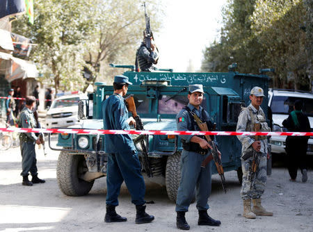 Afghan security forces inspect at the site of a suicide attack near a large Shi'ite mosque, Kabul, Afghanistan. September 29, 2017. REUTERS/Omar Sobhani