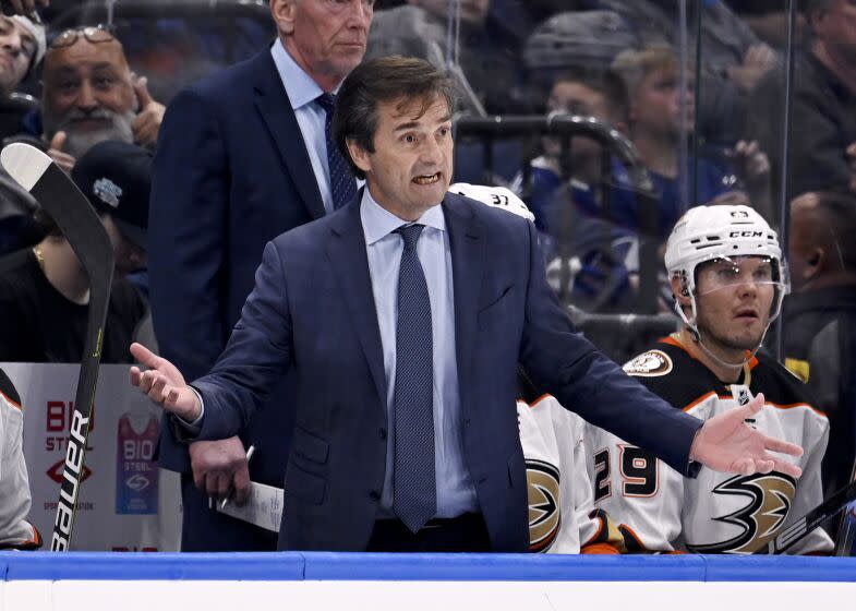 Anaheim Ducks coach Dallas Eakins react to a call during the third period of the team's NHL hockey game.