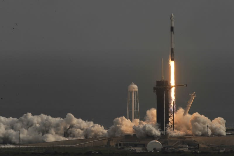 A SpaceX Falcon 9 rocket, carrying the Crew Dragon astronaut capsule, lifts off on an in-flight abort test from the Kennedy Space Center in Cape Canaveral