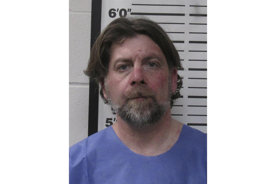 This booking photo provided by the McLean County, N.D., Sheriff's Office shows Ian Cramer. The 42-year-old son of U.S. Sen. Kevin Cramer crashed into a North Dakota sheriff's vehicle during a police chase, pushing it into a deputy and killing him, according to authorities and the Republican senator's family. Ian Cramer, of Bismarck, N.D., was arrested and jailed following the crash Wednesday, Dec. 6, 2023, and charges are pending, the North Dakota Highway Patrol said in a news release. (McLean County Sheriff's Office via AP)