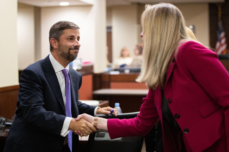 Defense attorney Daniel Rashbaum shakes Assistant State Attorney Georgia CapplemanÕs hand after his client, Charlie Adelson was found guilty for the murder of Dan Markel on Monday, Nov. 6, 2023.