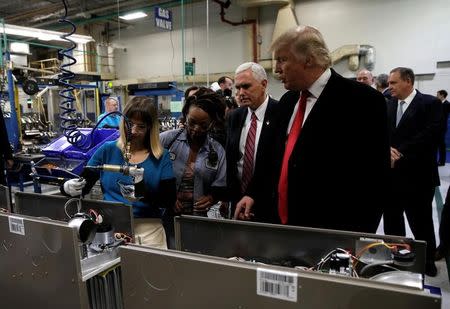 U.S. President-elect Donald Trump tours a Carrier factory with Vice President-elect Mike Pence in Indianapolis, Indiana, U.S., December 1, 2016. REUTERS/Mike Segar