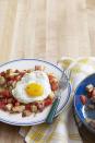<p>Why wait until lunch? Serve up a hearty breakfast the day after Thanksgiving to get a heads start on your fridge full of leftovers.</p><p><strong>Get the recipe at <a href="https://www.countryliving.com/food-drinks/recipes/a3717/turkey-hash-sunny-side-up-eggs-recipe-clx1111/" rel="nofollow noopener" target="_blank" data-ylk="slk:Country Living;elm:context_link;itc:0;sec:content-canvas" class="link ">Country Living</a>.</strong></p>