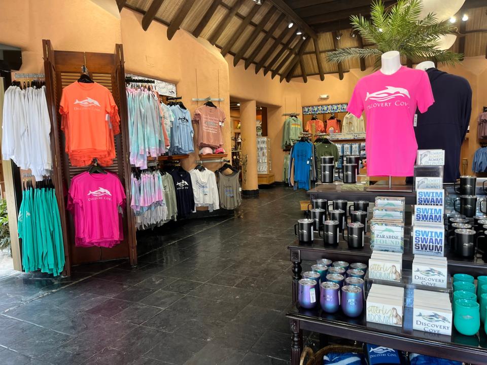 gift shop with colorful tshirts at discovery cove in orlando