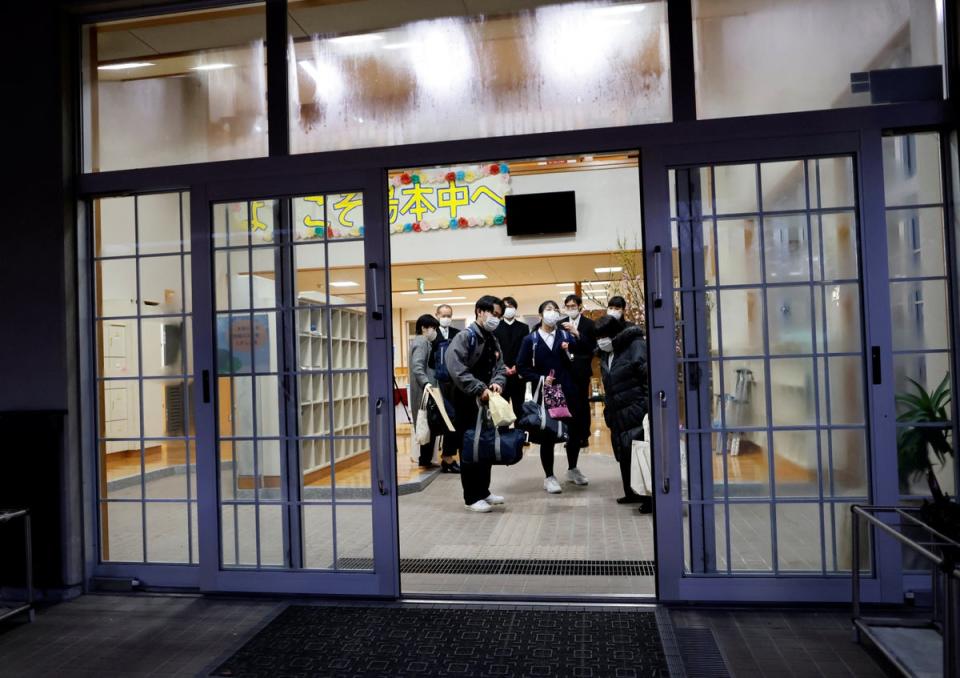 School’s out: the students and their family members leave after graduation (Reuters)