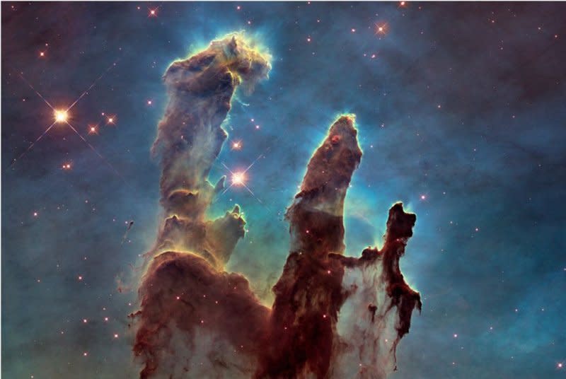 New research proposes a model that determines the universe’s age to be 26.7 billion years, which accounts for the James Webb Space Telescope’s "impossible early galaxy" observations. The telescope captured this Pillars of Creation image last year. File image courtesy of NASA/ESA