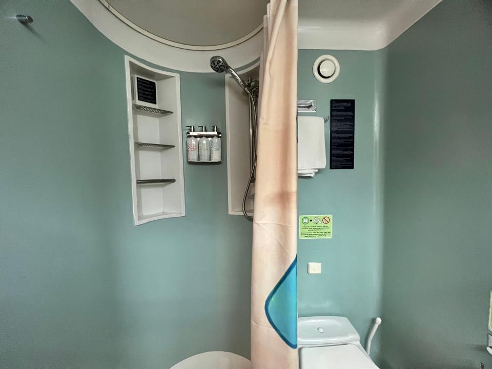 Margaritaville at Sea  interior stateroom bathroom with toilet, shower