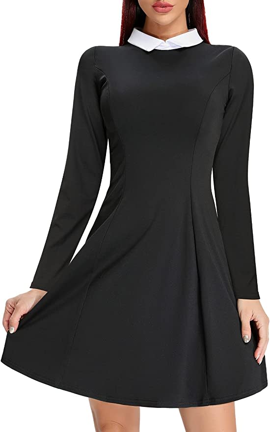 model wears casual skater dress with long sleeves and peter pan collar for women in black
