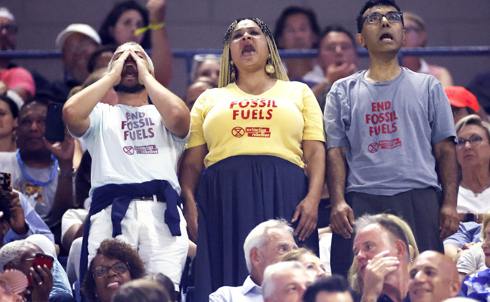 Protesters, pictured here during the US Open semi-final between Coco Gauff and Karolina Muchova.