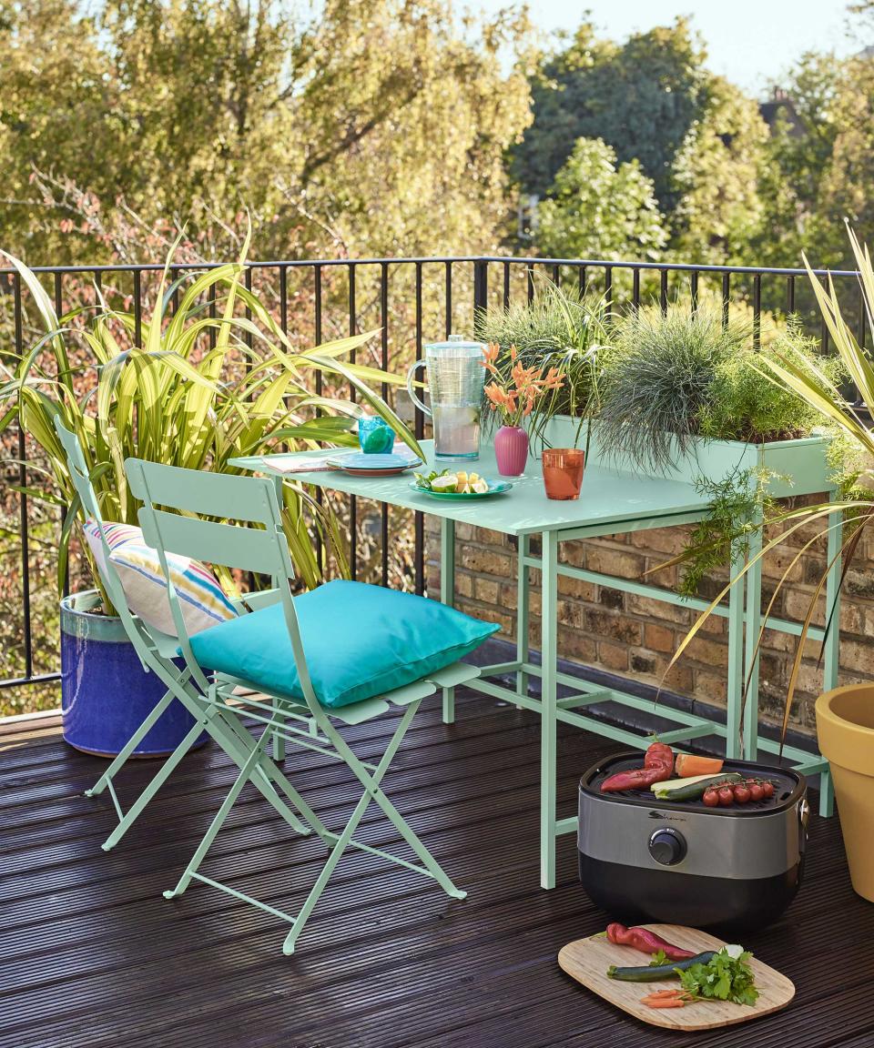 Pep up a small deck with clever and colorful furniture