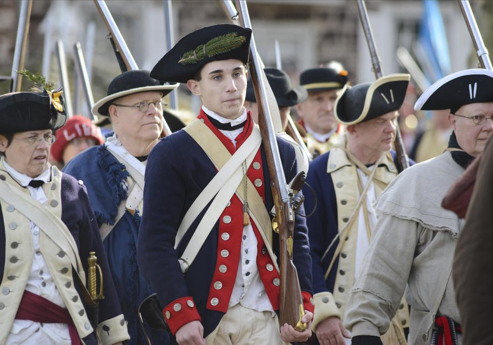 Soldiers march as they ready to go to their boats during the official Christmas Day Crossing of the Delaware reenactment by George Washington and his troops Wednesday, December 25, 2019 at Washington Crossing State Park in Washington Crossing, Pennsylvania. (WILLIAM THOMAS CAIN / PHOTOJOURNALIST)