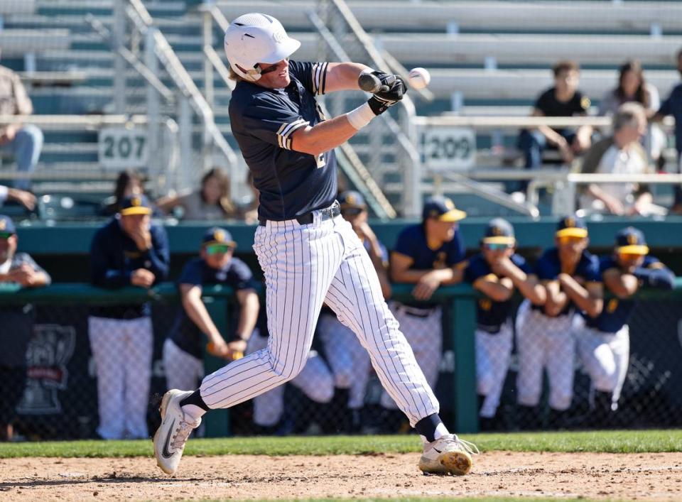 Central Catholic’s Seth Van Dyk singles during game with Gregori in the Modesto Nuts High School Baseball Showcase at John Thurman Field in Modesto, Calif., Saturday, March 16, 2024.