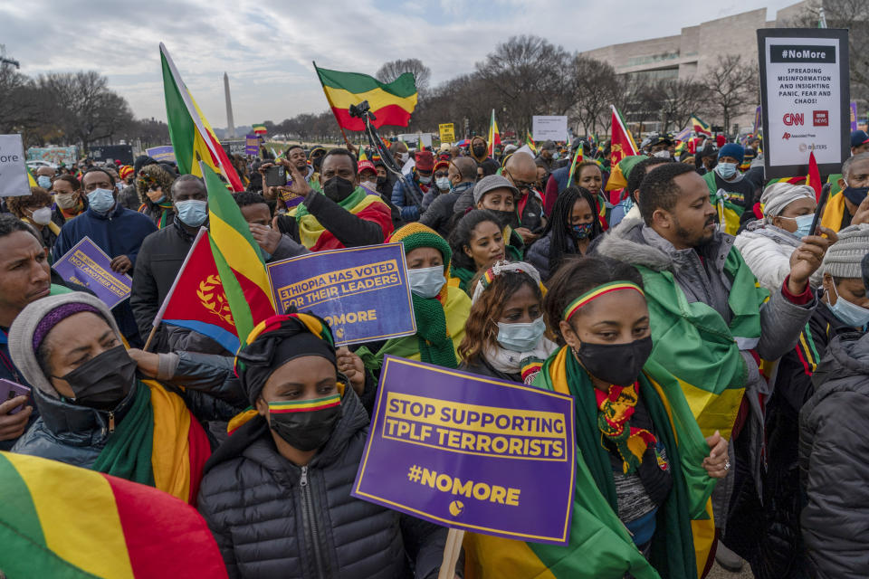 FILE - People from Ethiopian and Eritrea, supporters of Ethiopian Prime Minister Abiy Ahmed, participate in a protest against the U.S. and other western countries' intervention in their country and calling for the immediate end to Ethiopia's ongoing internal conflict in Washington, Friday, Dec. 10, 2021. A war in Ethiopia erupted in November 2020 when a disagreement between Prime Minister Abiy and Tigray leaders broke out into violence after a dispute over elections. (AP Photo/Gemunu Amarasinghe, File)