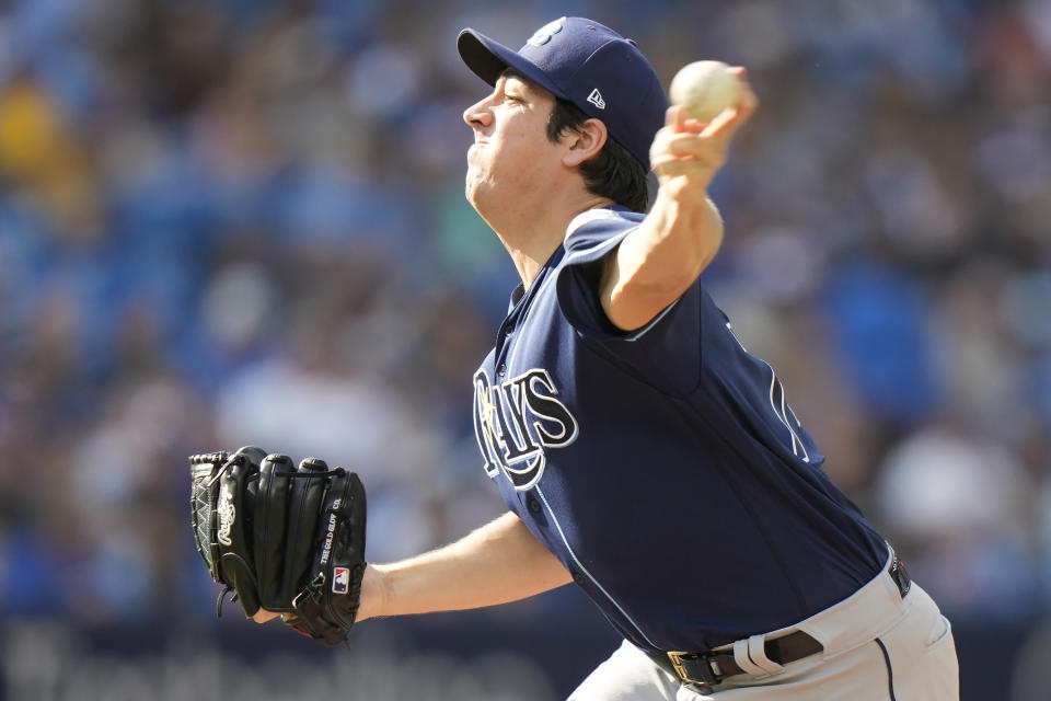 Tampa Bay Rays starting pitcher Jacob Lopez throws against the Toronto Blue Jays during first-inning baseball game action in Toronto, Sunday, Oct. 1, 2023. (Frank Gunn/The Canadian Press via AP)