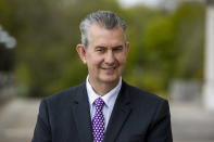 Edwin Poots, Northern Ireland Minister of Agriculture, Environment, and Rural Affairs (DAERA) poses outside Stormont's Parliament Buildings ahead of his bid to become leader of the Democratic Unionist Party (DUP), in Belfast, Northern Ireland, Monday May 10 2021. Northern Ireland’s largest British unionist party is choosing a new leader Friday May 14, 2021, in a contest between Northern Ireland Agriculture Minister Edwin Poots and lawmaker Jeffrey Donaldson, with only 36 eligible voters and the result due late Friday afternoon.(Liam McBurney/PA via AP)