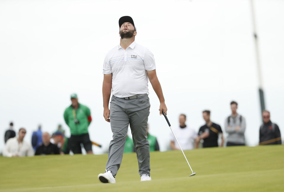 Spain's Jon Rahm reacts after missing a putt on the 17th green during the first round British Open Golf Championship at Royal St George's golf course Sandwich, England, Thursday, July 15, 2021. (AP Photo/Peter Morrison)