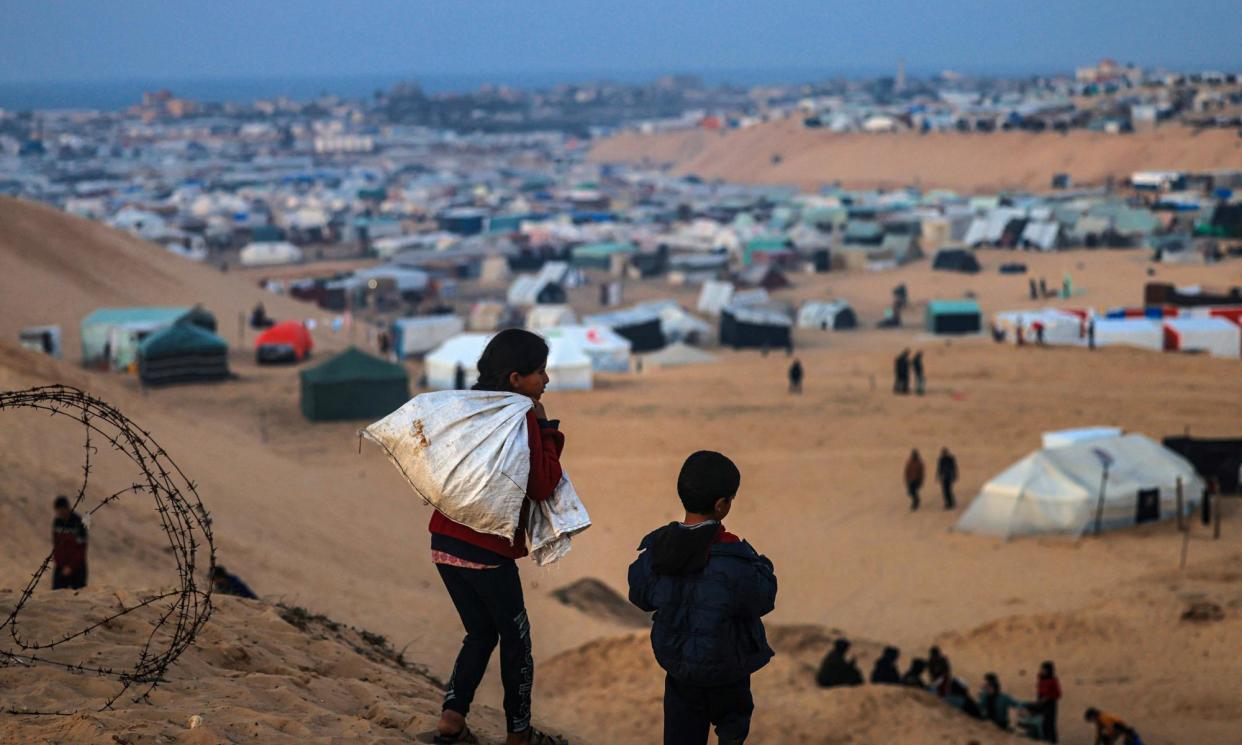 <span>Displaced Palestinians in Rafah, on the southern Gaza Strip on the border with Egypt. Official exit points from Gaza are limited due to the number of people attempting to leave Palestine through Rafah.</span><span>Photograph: AFP/Getty Images</span>