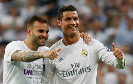 Football Soccer - Real Madrid v Manchester City - UEFA Champions League Semi Final Second Leg - Estadio Santiago Bernabeu, Madrid, Spain - 4/5/16 Real Madrid's Cristiano Ronaldo and Jese celebrate after the game Reuters / Paul Hanna Livepic