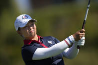 United States' Megan Khang plays a tee shot during her seventeen match during her single match at the Solheim Cup golf tournament in Finca Cortesin, near Casares, southern Spain, Sunday, Sept. 24, 2023. Europe play the United States in this biannual women's golf tournament, which played alternately in Europe and the United States. (AP Photo/Bernat Armangue)