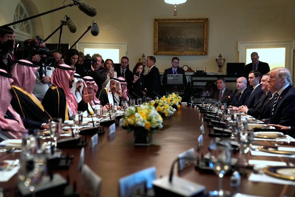 Donald Trump and Crown Prince Mohammed bin Salman sit down to a working lunch with their delegations at the White House on March 20, 2018. (Photo: Jonathan Ernst/Reuters)