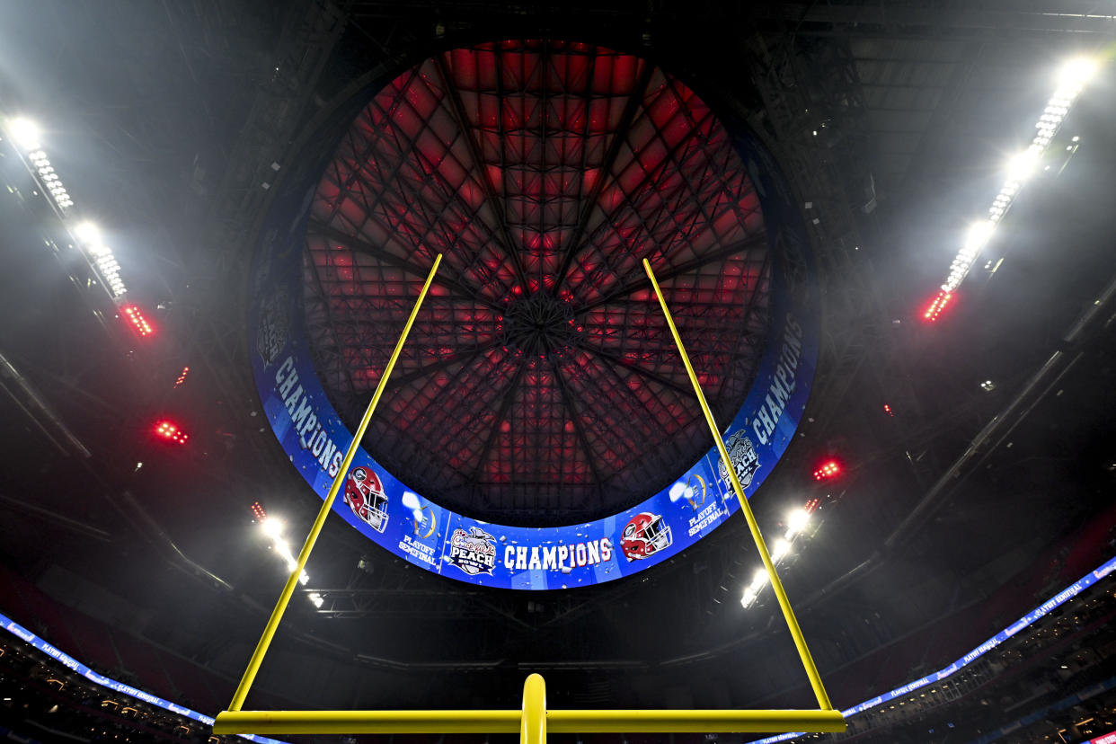 The Mercedes-Benz stadium is seen after the Peach Bowl NCAA college football semifinal playoff game between Georgia and Ohio State, Sunday, Jan. 1, 2023, in Atlanta. Georgia won 42-41. (AP Photo/Danny Karnik)