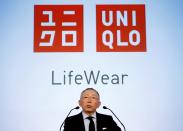 FILE PHOTO: Tadashi Yanai, chairman and CEO of Fast Retailing, attends a news conference in Tokyo