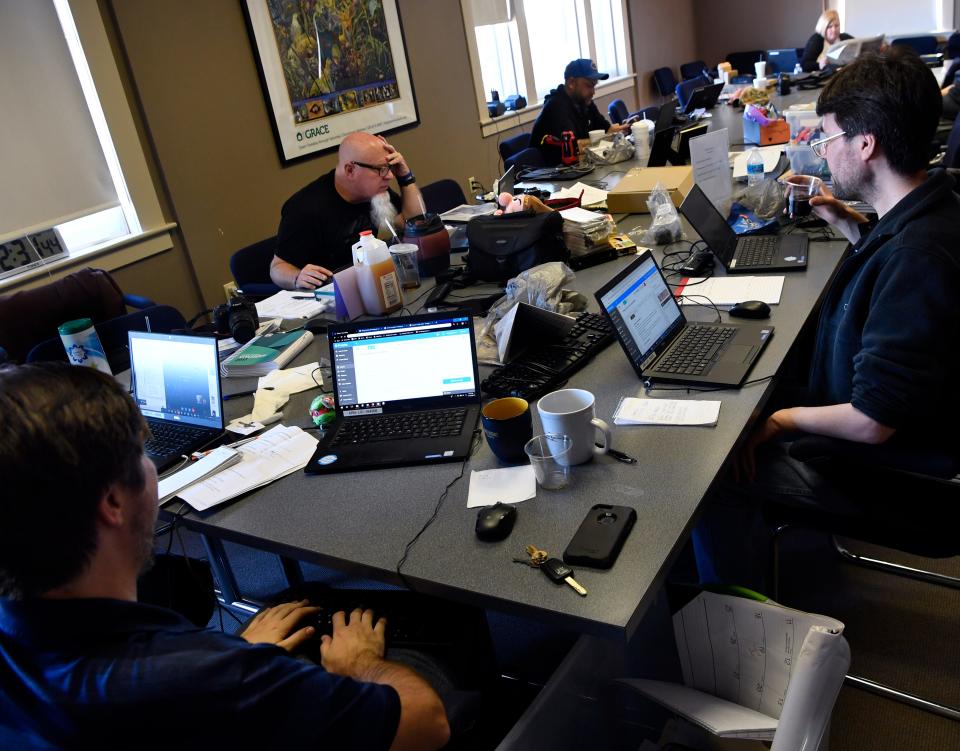 Education reporter Timothy Chipp (left), editor Greg Jaklewicz and editorial assistant Nathaniel Ellsworth work on the Saturday edition of the Abilene Reporter-News from the board room of the Grace Museum on Nov. 16, 2018.