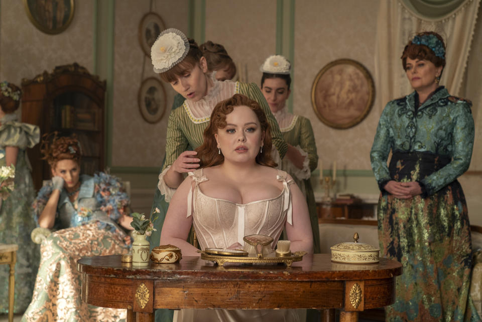 Bridgerton (starring Nicola Coughlan, pictured) is back. Read what experts have to say about corsets before you try the trend. (Everett)