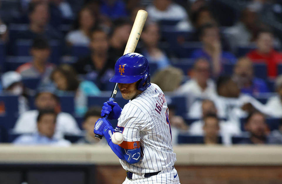 New York Mets' Jose Iglesias is hit by a pitch during the second inning of a baseball game against the New York Mets, Tuesday, June 11, 2024, in New York. (AP Photo/Noah K. Murray)