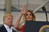 <p>US President Donald Trump and First Lady Melania Trump arrive for a rally on February 18, 2017 in Melbourne, Florida. (Nicholas Kamm/AFP/Getty Images) </p>