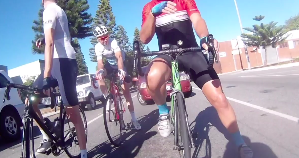 The cyclists wait to turn right with the driver behind them wanting to go straight. Source: Cycliq