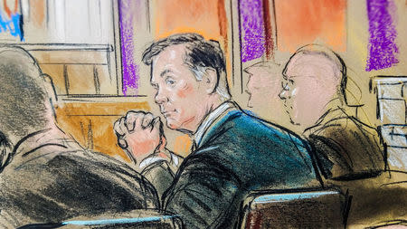 Former Trump campaign manager Paul Manafort is shown in a court room sketch, as he sits in federal court on the opening day of his trial on bank and tax fraud charges stemming from Special Counsel Robert Mueller's investigation into Russian meddling in the 2016 U.S. presidential election, in Alexandria, Virginia, U.S. July 31, 2018. REUTERS/Bill Hennessy