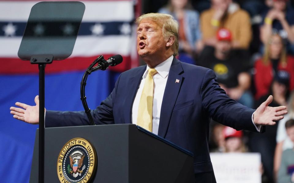 U.S. President Donald Trump gestures as he holds a campaign rally in Colorado Spring - Reuters