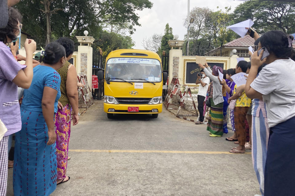 A bus carrying released prisoners leaves Insein Prison in Yangon, Myanmar Wednesday, May 3, 2023. Myanmar’s ruling military council says it is releasing more than 2,100 political prisoners as a humanitarian gesture. Thousands more remain imprisoned on charges generally involving nonviolent protests or criticism of military rule, which began when the army seized power in 2021. (AP Photo/Thein Zaw)