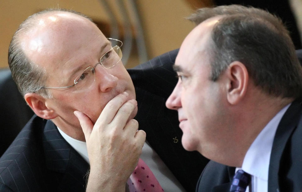 As finance secretary in the first SNP government, John Swinney, left, worked closely with then first minister Alex Salmond (Danny Lawson/PA)