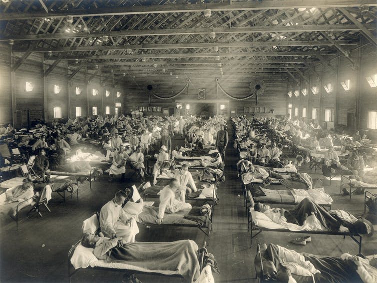 <span class="caption">Emergency hospital during the 1918 flu epidemic, Camp Funston, Kansas.</span> <span class="attribution"><a class="link " href="https://commons.wikimedia.org/w/index.php?curid=25513204" rel="nofollow noopener" target="_blank" data-ylk="slk:Otis Historical Archives/Wikimedia Commons;elm:context_link;itc:0;sec:content-canvas">Otis Historical Archives/Wikimedia Commons</a></span>