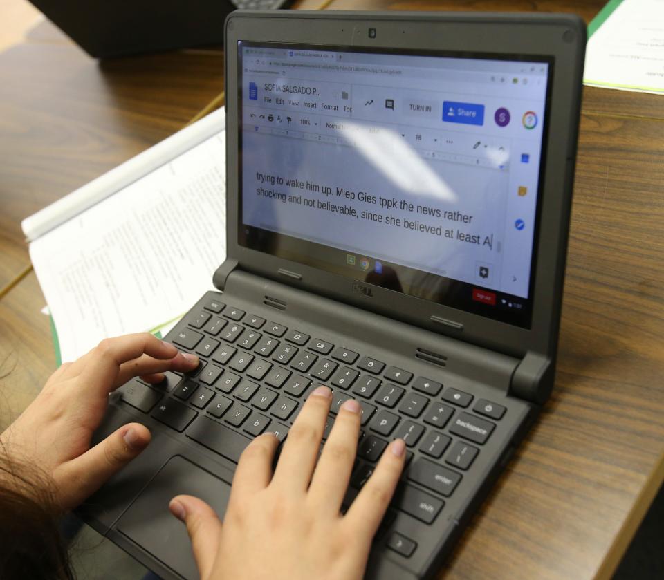 A student gets ready for the Florida Standards Assessments by writing a practice essay.