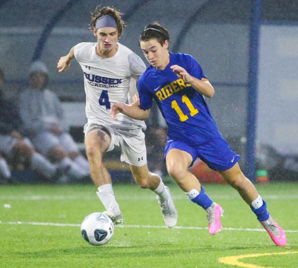 Caesar Rodney's Trevor Sullivan (right)