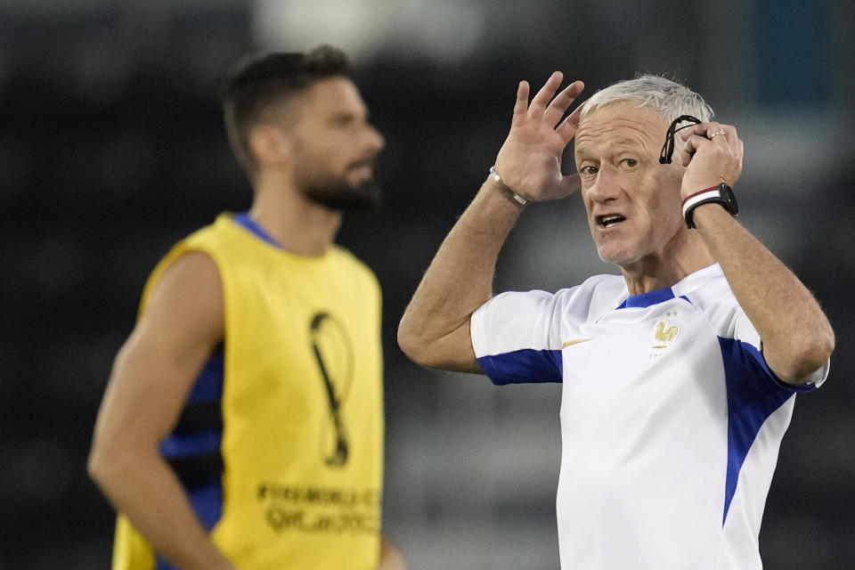 France's head coach Didier Deschamps gestures during a training session at the Jassim Bin Hamad stadium in Doha, Qatar, Tuesday, Nov. 29, 2022 on the eve of the group D World Cup soccer match between Tunisia and France. (AP Photo/Christophe Ena)