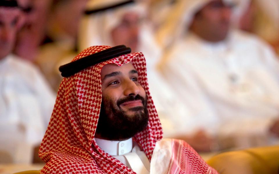 In this Oct. 23, 2018, file photo, Saudi Crown Prince Mohammed bin Salman smiles as he attends the Future Investment Initiative summit in Riyadh, Saudi Arabia. A Saudi court issued final verdicts on Monday, Sept. 7, 2020, in the case of slain Washington Post columnist and Saudi critic Jamal Khashoggi after his family announced pardons that spared five of the convicted individuals from execution. Prior to his killing in late 2018 inside the Saudi consulate in Turkey, Khashoggi had written critically of the crown prince in columns for the Washington Post. - AP