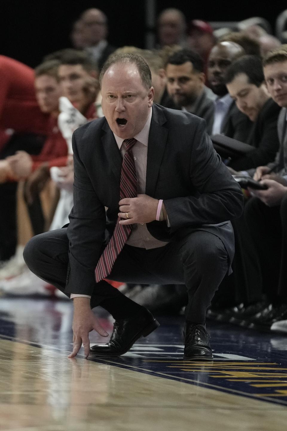 Wisconsin head coach Greg Gard reacts during the second half of an NCAA college basketball game against Marquette Saturday, Dec. 3, 2022, in Milwaukee. Wisconsin won 80-77 in overtime. (AP Photo/Morry Gash)