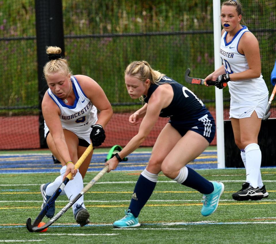 Worcester State's Emily Saucier battles for the ball with Ulster University's Rebecca Dwyer on Tuesday.