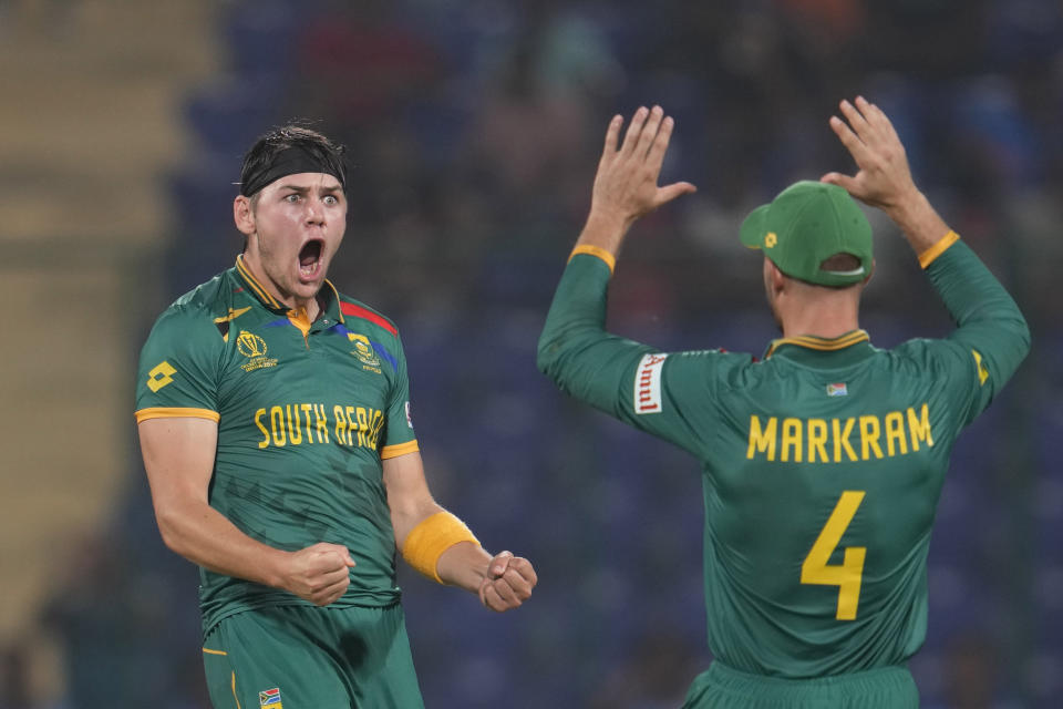 South Africa's Gerald Coetzee celebrates the dismissal of Sri Lanka's Dunith Wellalage during the ICC Cricket World Cup match between South Africa and Sri Lanka in New Delhi, India, Saturday, Oct. 7, 2023. (AP Photo/Altaf Qadri)