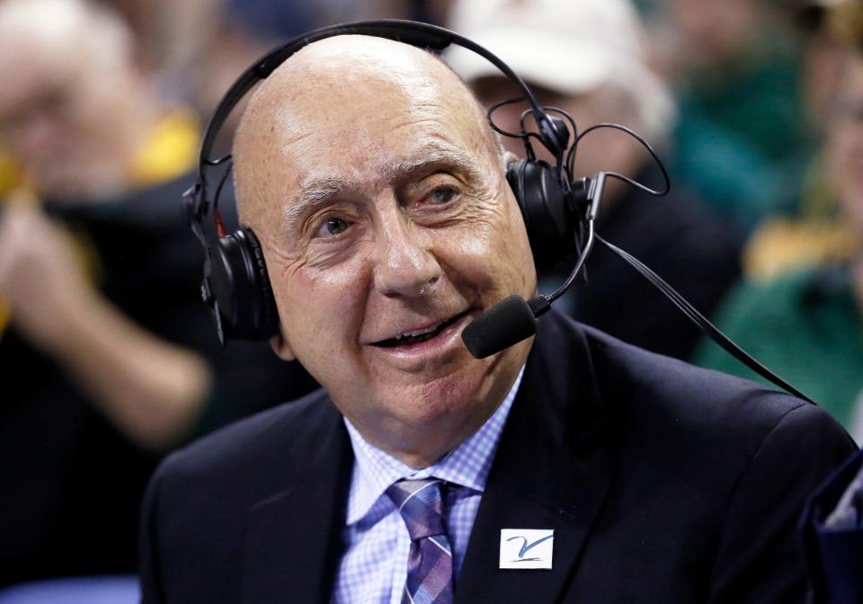 ABC/ESPN basketball analyst Dick Vitale sits at mid-court prior to an NCAA college basketball game between the Baylor Bears and the Villanova Wildcats on Sunday, Dec. 12, 2021, in Waco, Texas. (AP Photo/Ray Carlin)