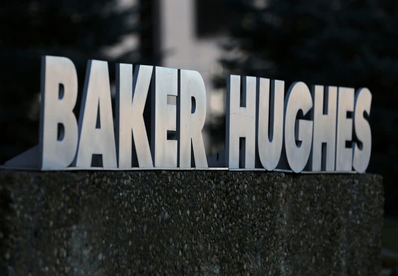 FILE PHOTO: A Baker Hughes sign is displayed outside the oil logistics company's local office in Sherwood Park