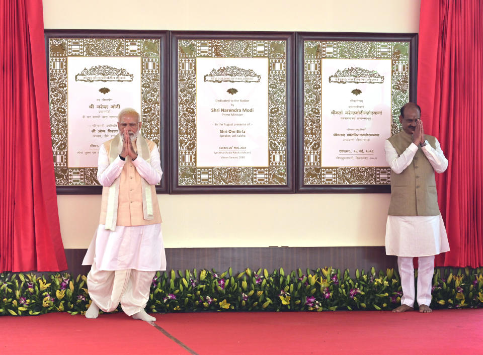 Indian prime minister Narendra Modi, left, with speaker of the lower house Om Birla greet after inaugurating New parliament building, in New Delhi, India, Sunday, 28 May 2023. The new triangular parliament building, built at an estimated cost of $120 million, is part of a $2.8 billion revamp of British-era offices and residences in central New Delhi called "Central Vista", even as India's major opposition parties boycotted the inauguration, in a rare show of unity against the Hindu nationalist ruling party that has completed nine years in power and is seeking a third term in crucial general elections next year. (AP Photo)