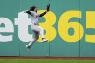 CORRECTS SPELLING TO VILADE, INSTEAD OF VILLAGE - Detroit Tigers right fielder Ryan Vilade catches a fly ball for the out on Cleveland Guardians' Estevan Florial during the first inning of a baseball game Tuesday, May 7, 2024, in Cleveland. (AP Photo/Sue Ogrocki)