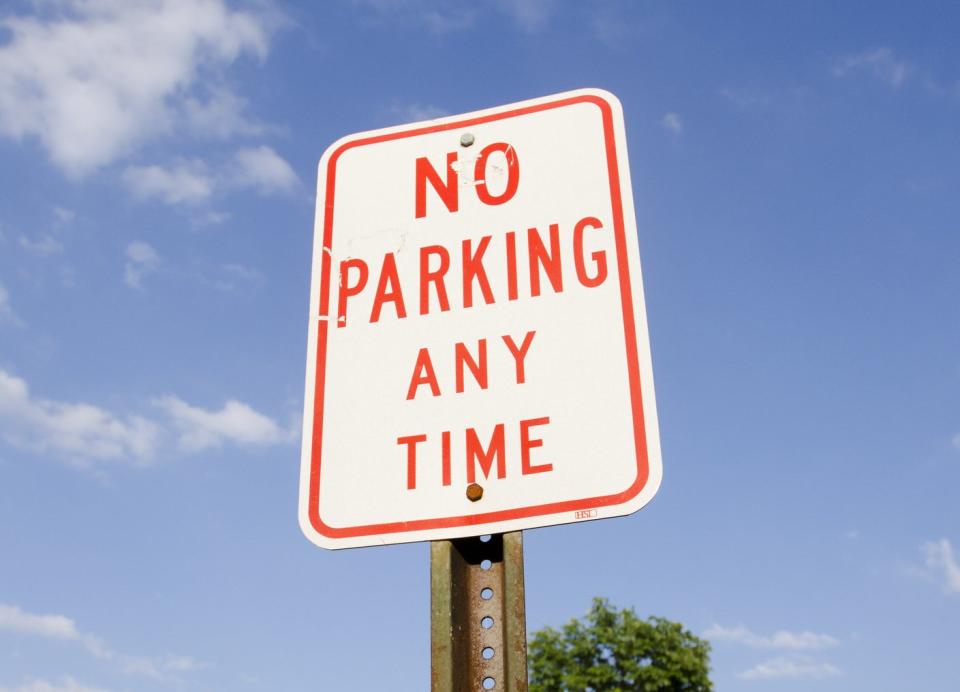 A street sign that reads, "No parking any time"